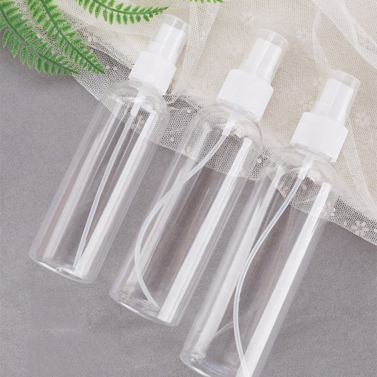 Wholesale price custom 100ml spray cap round clear cheap empty plastic cosmetic bottle