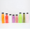 China Hot Sell Travel Portable Transparent Unique Round Lid 500ml Carbonated Fruit Juice Bottle