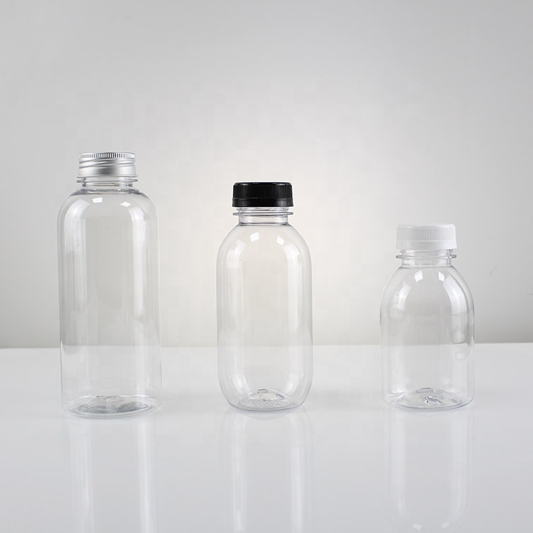 Clear Screw Cap PET Plastic Plastic Beverage Fruit Juice Round Bottle Manufacturers
